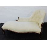 Victorian walnut framed chaise longue with a button upholstered spoon back and serpentine seat, on