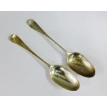 Two 18th century Hanoverian pattern silver spoons, one with maker mark IM, the other with