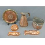 Collection of copper ware to include a gallon jug, jelly moulds, a tray etc., (a lot)