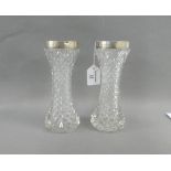 A pair of silver mounted cut glass vases, Birmingham 1938, 20cm high (2)