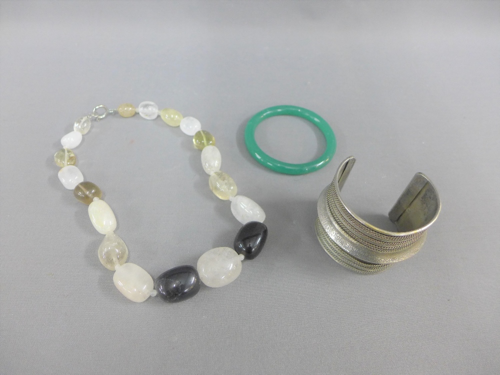 Mixed lot to include a white metal cuff bangle, hard stone beads and bangle (3)