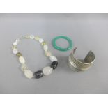 Mixed lot to include a white metal cuff bangle, hard stone beads and bangle (3)