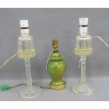 Pair of cut glass table lamp bases, 27cm high excluding fittings and a green pottery baluster