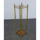 Early 20th century brass stick stand with four divisions, 68 x 20 cm