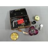 Black tin cash box containing a vintage Gents Bulova wristwatch, Art Deco powder compact, travel