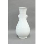 Late 18th / early 19th century Dehua vase with bulbous body and long neck with a flared rim and