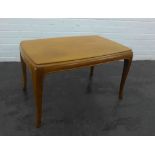 Mahogany low table, the rectangular top with moulded edge, on sabre legs 44 x 76 cm