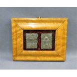 Burr wood frame containing two antique silver and gold metallic thread prayer book covers, size