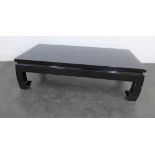 Ebonised low coffee table, 36 x 120 cm