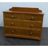Mahogany ledge back chest, the rectangular top with a moulded edge, above two short and two