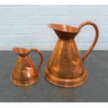 Large copper jug with another smaller, 34cm (2)