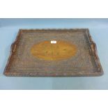 Indian carved hardwood tray with retailers label for Punwani Brothers, Calcutta to the base, 54 x 36