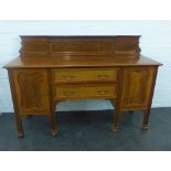 Mahogany ledgeback sideboard with two central drawers flanked by cupboard doors, on ball and claw