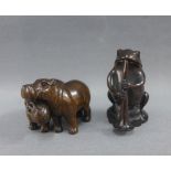 Two Japanese Netsuke's to include a Frog playing a musical instrument, together with a Netsuke of