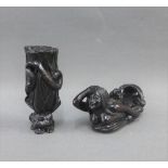 Two Japanese dark wooden Netsuke's to include a Toad, Snake and Tree Stump, together with a Mermaid,