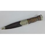 White metal mounted Skean Dubh with braid pattern handle and Cairngorm terminal, 20cm