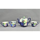 Mak Merry, hand painted Scottish pottery table wares, to include a teapot, two cups and a milk