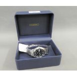 Gent's modern Seiko stainless steel wristwatch with midnight blue face, hour baton markers and