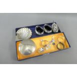 Mixed lot to include Birmingham silver three piece condiment set, London silver shell dish,