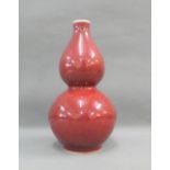 Chinese Sang de Boeuf double gourd vase, 22 cm