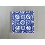 Late 19th / early 20th century Chinese blue and white tile of square form, painted with geometric