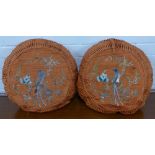 Pair of round silk embroidered cushions with blue bird pattern, 14cm diameter, (2)