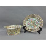 Chinese famille rose reticulated basket and oval plate painted with figures, flowers and foliage,