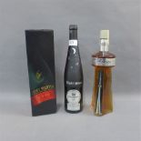 CN Tower La tour Canadian Whisky, Canadien 40% vol, together with a bottle of Remy Martin Fine