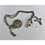 Unusual Edwardian silver whistle, with Albert chain, lion mask roundel / holder and removable cover,