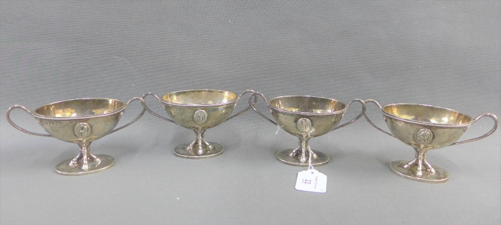 Set of four Victorian Scottish silver salts, with oval bowls, reeded rims, twin handles and pedestal
