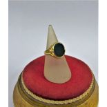 18 carat gold signet ring with oval bloodstone plaque, UK ring size O