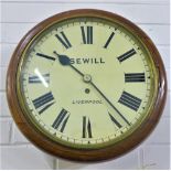 Late 19th / early 20th century oak cased fusee wall clock, the enamel dial inscribed Sewell