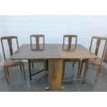 Art Deco oak drop-leaf table with single drawer and cupboard to the base with four chairs, 75 x