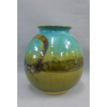 Studio pottery vase with a green glazed vase with tenmuko glaze, with impressed monogram IS to the