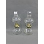 Pair of glass oil lamps, (2)