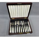 Late Victorian set of six silver mounted mother of pearl fruit knives and forks, Sheffield 1890,