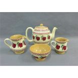 Nicholas Mosse collection of 'Apple' pattern table wares to include a teapot, two jugs and a sugar