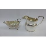 Victorian silver cream jug, Horace Woodward & Co, London 1885 together with another silver cream