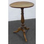 Georgian mahogany pedestal wine table with the circular top on a baluster turned column, on tripod
