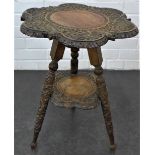 Carved hardwood side table with flowerhead top and tripod legs, 56 x 42cm