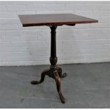 Georgian mahogany tilt top table with the rectangular top on a baluster turned column on tripod vase