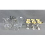 Mixed lot to include six Epns goblets, two glass water jugs and two decanters, (10)