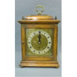 Oak cased mantle clock with caddy top, silvered chapter ring with Arabic numerals and an Empire