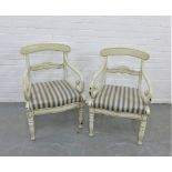 A pair of 19th century Scandinavian light grey painted wooden open armchairs, with striped