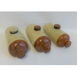 Three stoneware hot water pigs (3)