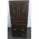 Early 20th century oak kitchen cabinet with two cupboard doors over a short frieze drawer above