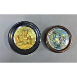 Two Pratt ware pot lids, framed, to include 'A Fix' framed, largest 15cm