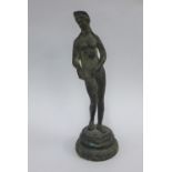 19th Century copy of a Roman votive bronze on a circular base, 14cm high