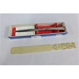 Early 20th century ivory paper knife and a Sheffield silver paper knife (2)