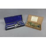 Set of travelling scales and weights, together with a boxed measuring scale, (2)
